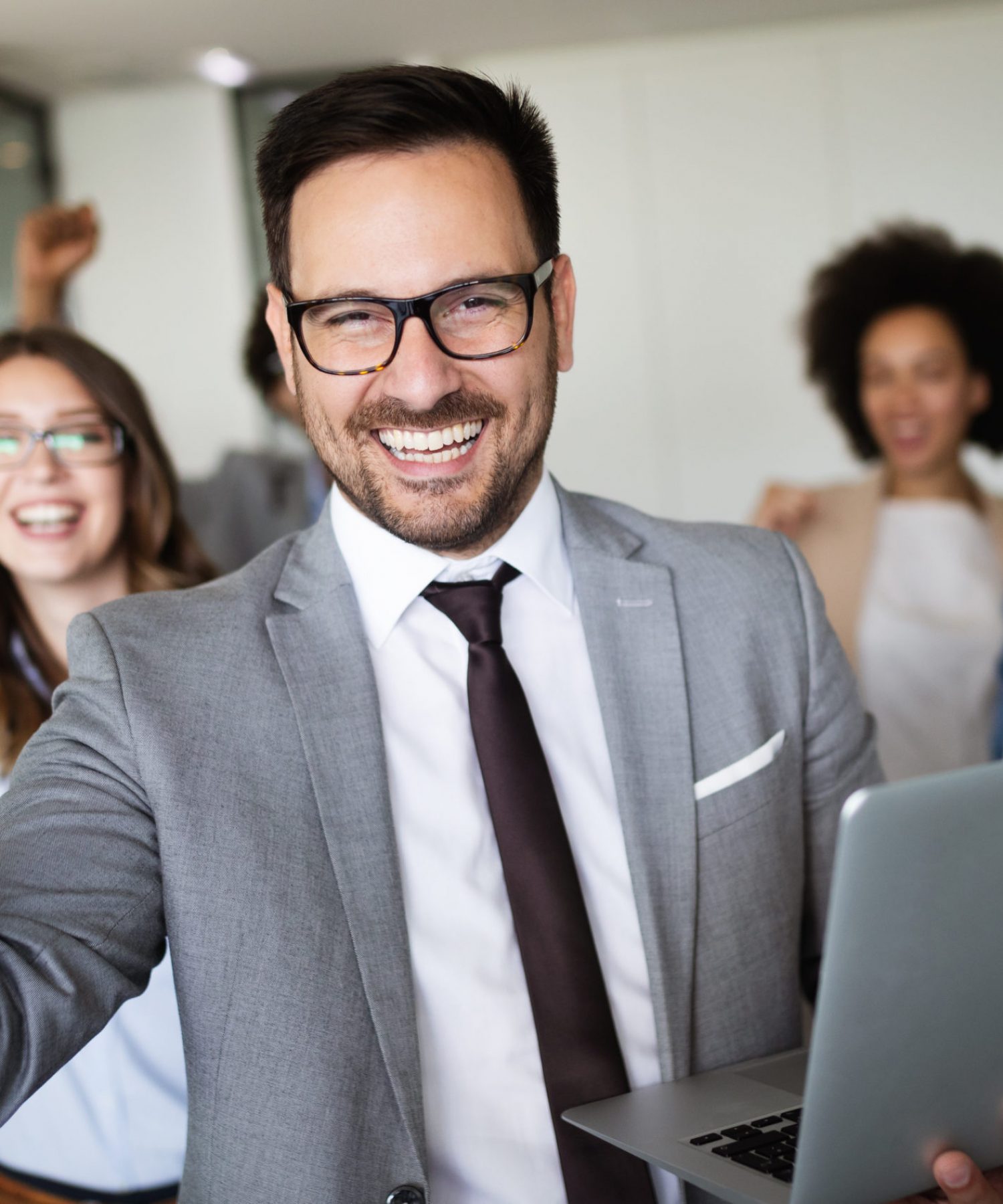 Successful company with happy workers in office Successful company with happy workers in modern office